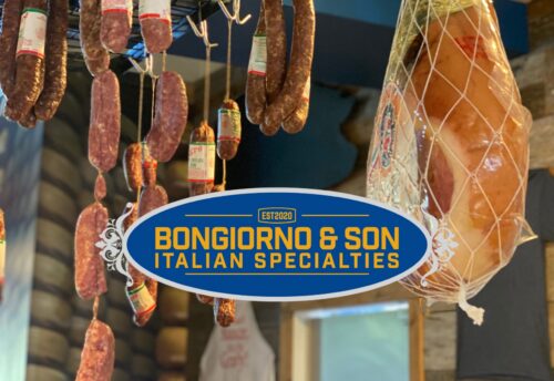 A photo of aged sausages and italian meats announces the opening of Bongiorno & Son at The Exchange in Raleigh