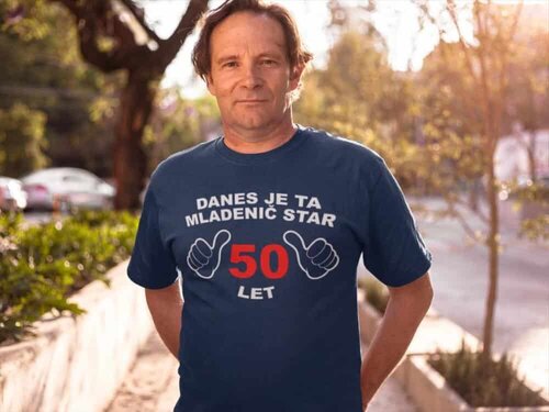 middle aged man wearing a round neck tshirt mockup while standing against the sun a15931 1 scaled