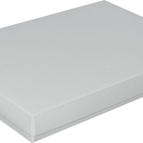 White rectangular cardboard box with a closed lid, photographed from a corner angle