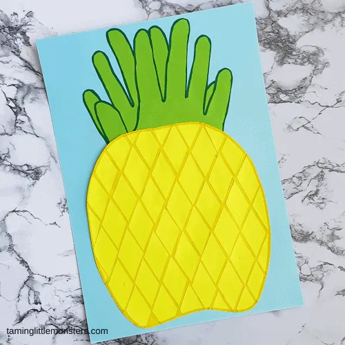 pineapple paper craft made with handprints