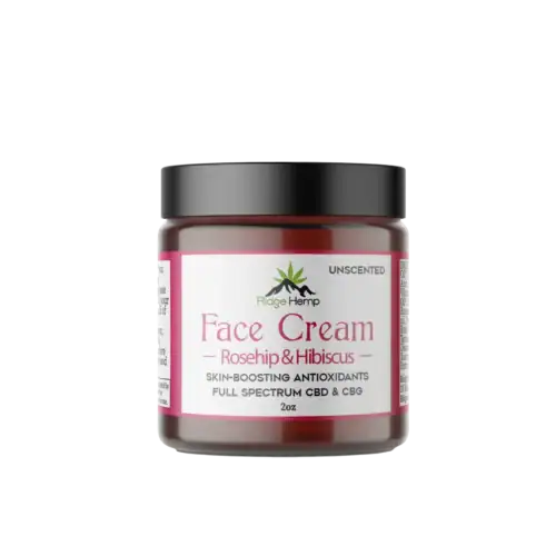 Botanical CBD+CBG Facial Cream in an amber jar with a black lid and a label that says Face Cream Rosehip & Hibiscus