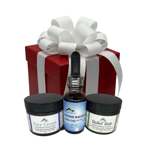 Ridge Hemp CBD gift set featuring a red box, Serene Balance CBD Oil bottle, Relief Rub jar, and Lavender & Chamomile Face Cream jar.