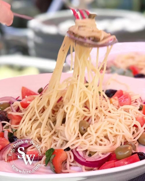 Quick Summer Spaghetti being pulled together with a spoon and fork