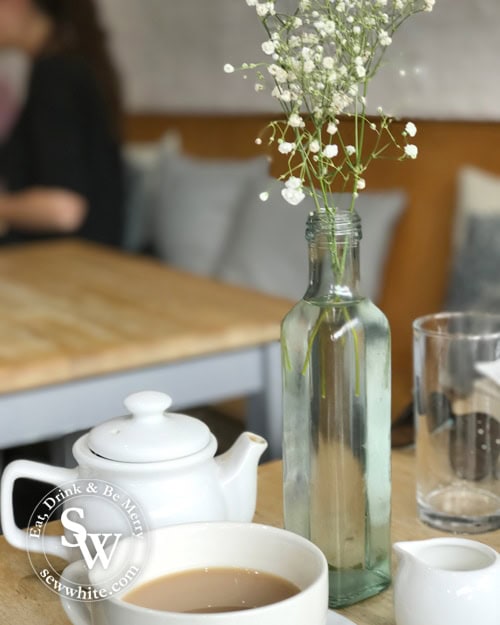 babys breath flowers on a table with tea at Coolangatta Wimbledon