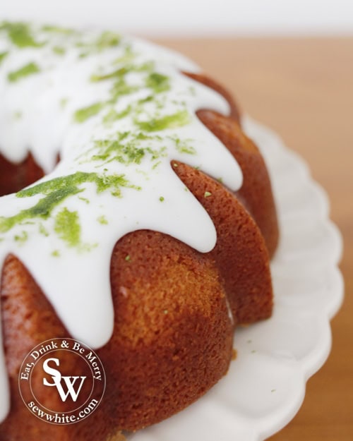 Daiquiri bundt Cake with zest of lime on top of the white icing