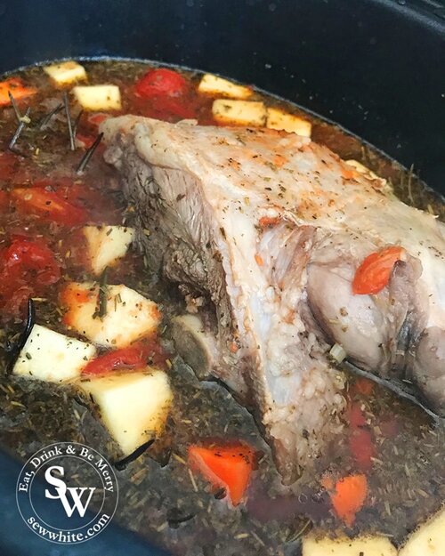 Easy Slow Cooker Lamb Stew recipe. Lamb shoulder in the stock and vegetables