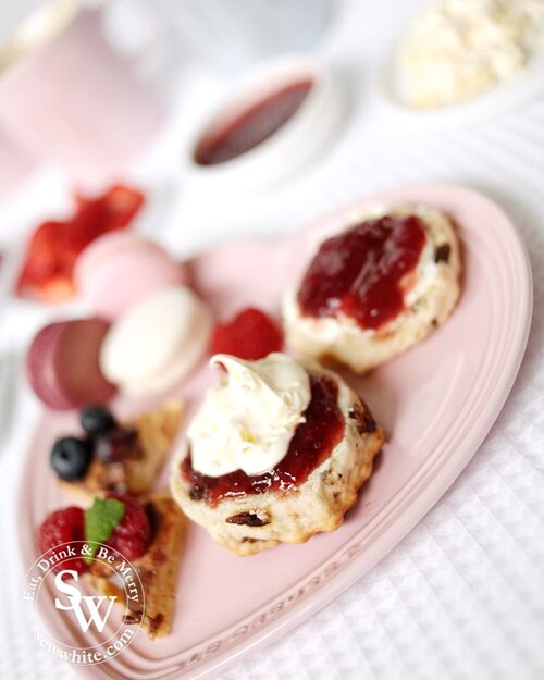 Jam then clotted cream or clotted cream than jam on your scone.