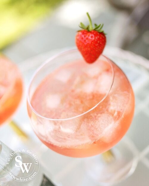 Sunset red gin and tonic made with Strawberry Jam and Whitley Neill Gin and Gallybird Tonic 