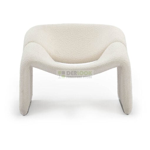 The Groovy Chair – Sculptural silhouette with a luxe stainless steel base and tactile bouclé finish.