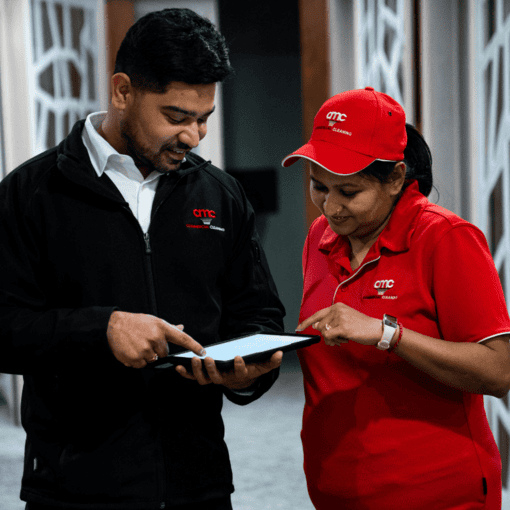 Site Supervisor, Customer Service Manager reviewing cleaning standards with cleaner on site