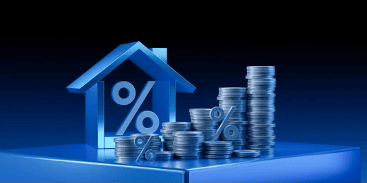 Home loan interest rates represented by a house and stacks of coins
