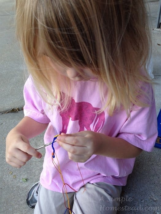 practicing crocheting
