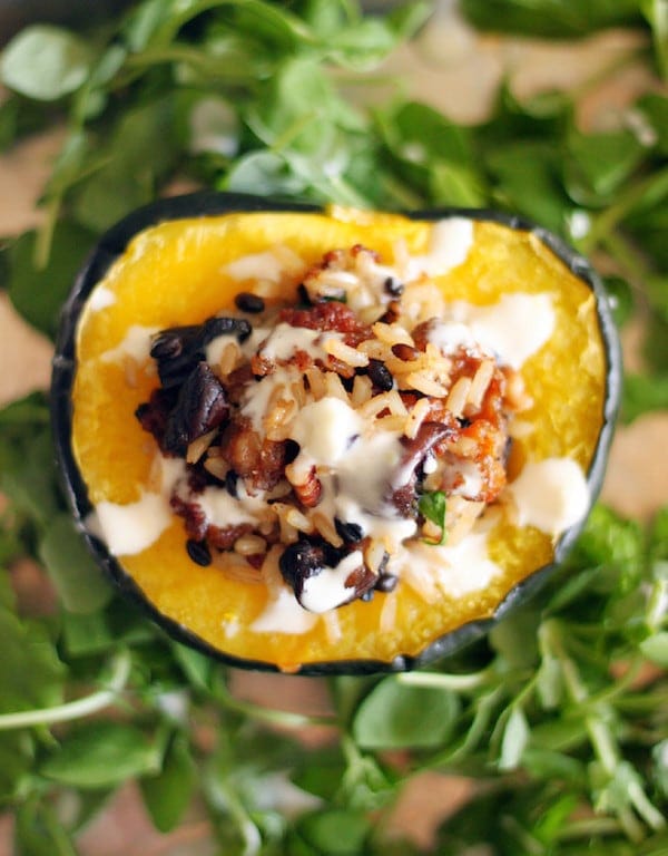 Sausage and Rice Stuffed Acorn Squash with Lemon Drizzle