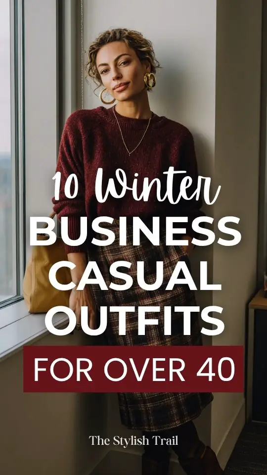 A woman over 40 wears a winter business casual outfit with a burgundy knit sweater tucked into a plaid midi skirt with tights and ankle boots