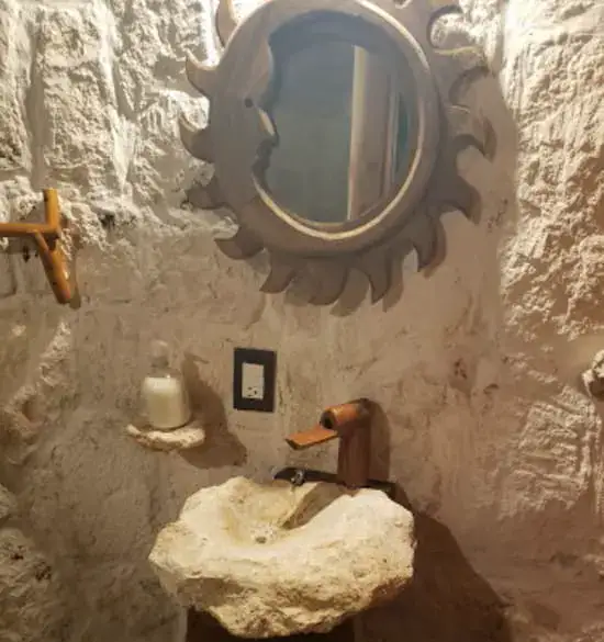 baño rustico dentro de las cabañas