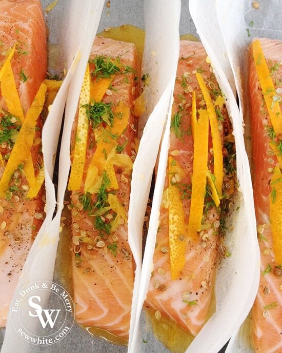 Spiced Orange Salmon Parcels with orange zest, fresh herbs and spices