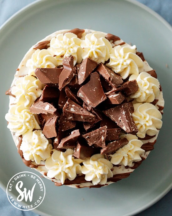 The Toblerone Cheesecake topped with extra Toblerone pieces on top.