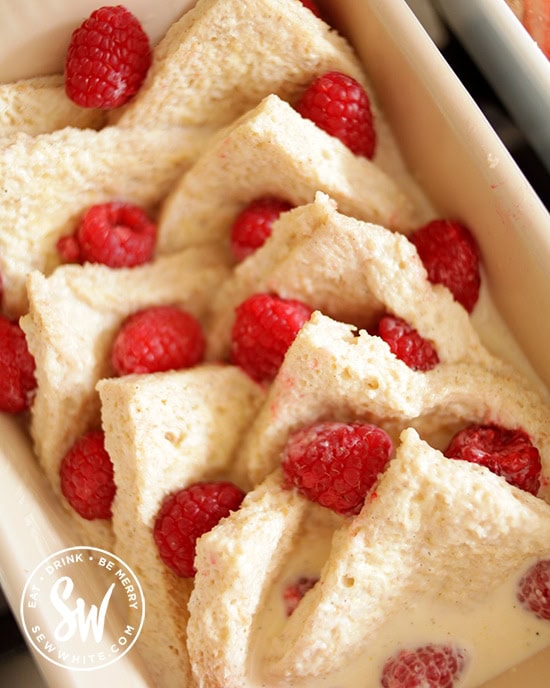 buttered bread slices with raspberries 