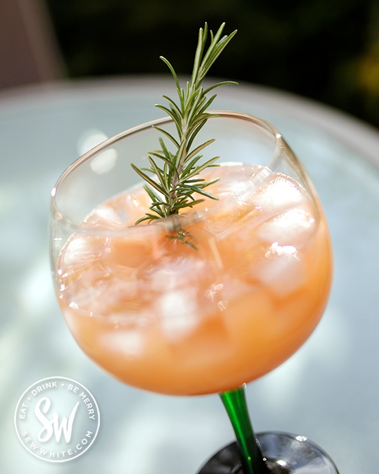 Aperol apple cocktail in the easy cocktail recipes decorated with fresh rosemary