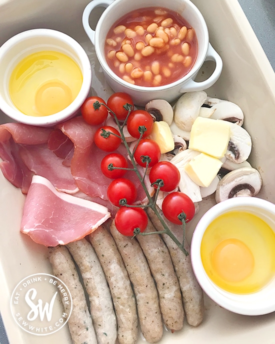 Before roasting the oven fry up. Egg, beans, sausages, mushroom and bacon in an oven proof dish.