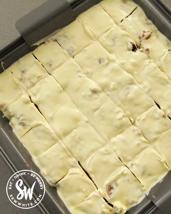 white chocolate being cut up