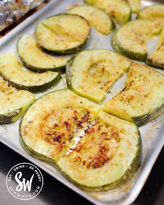 Golden brown roasted cheesey round courgettes