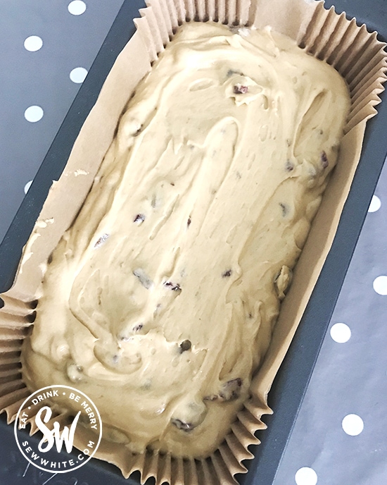 Chocolate Cranberry Cake in a loaf tin ready for the oven