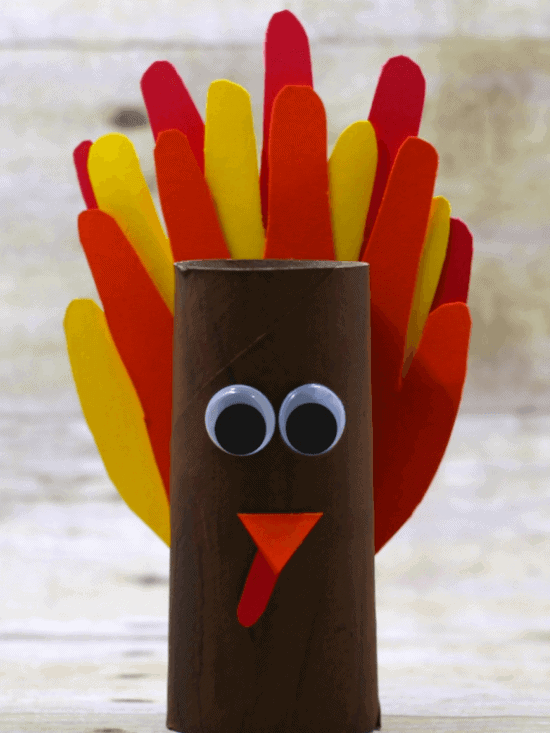 Turkey handprint craft made with cardboard rolls for kids