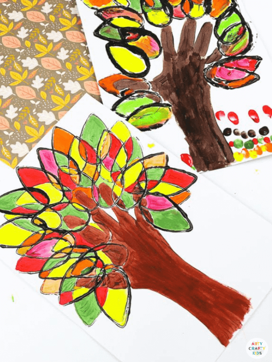 paper roll handprint ideas for kids for fall featuring leaves in red, green and brown