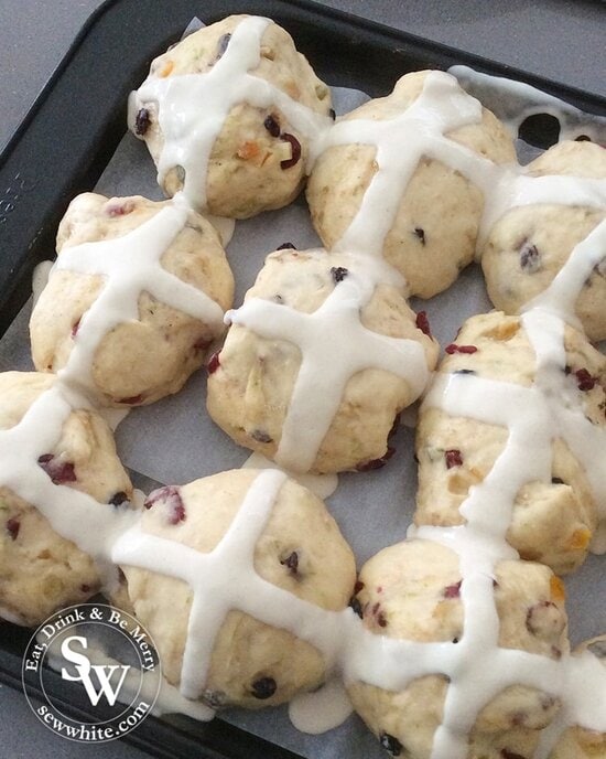Drawing the cross on the hot cross buns.