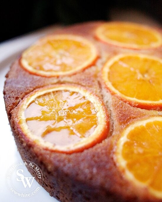 Glistening drizzle over the freshly baked Orange Upside Down Cake orange sponge.