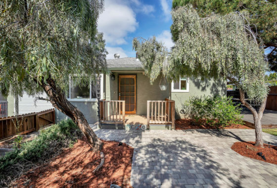 drought tolerant landscape in front of a green colored bungalow home in South Park