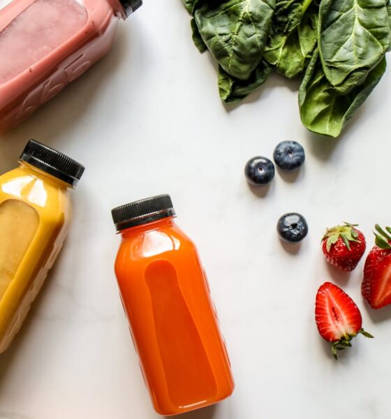 smoothie in bottles berries and green leaves. True Sea Moss recall