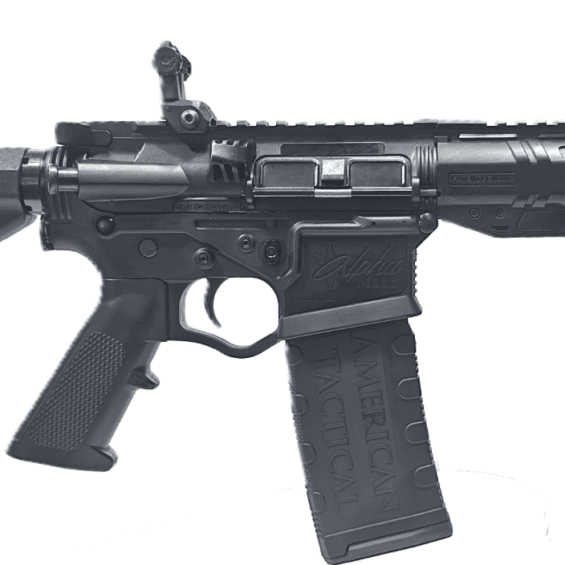 Black tactical rifle shown from the side with a collapsible stock, rail system, and curved magazine.