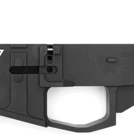 Close-up of a black firearm lower receiver with a triangular JT logo and the marking 'MODEL JT-15'.