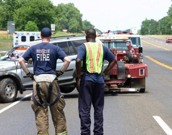 Houston lawyer reviewing car accident evidence with client