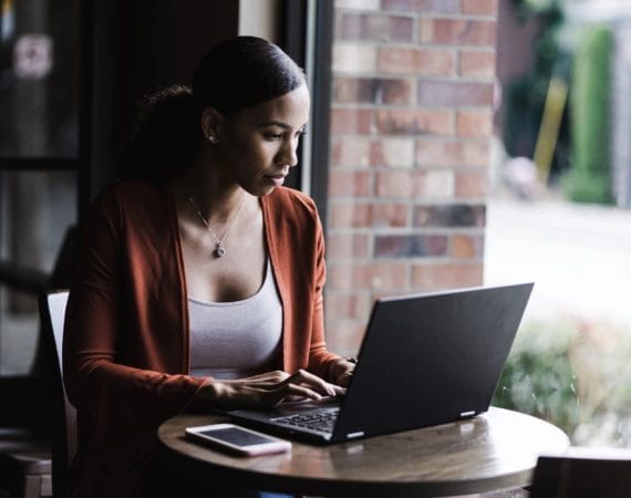 Injured Texas worker reviewing paperwork after car accident