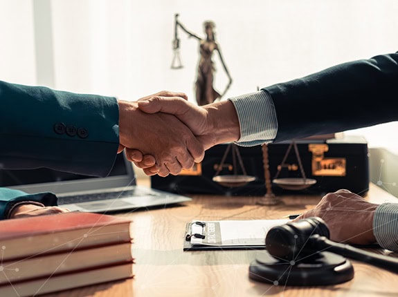 Legal members shaking hands