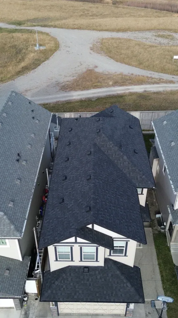 Aerial view of a new asphalt shingle roof on a Calgary home