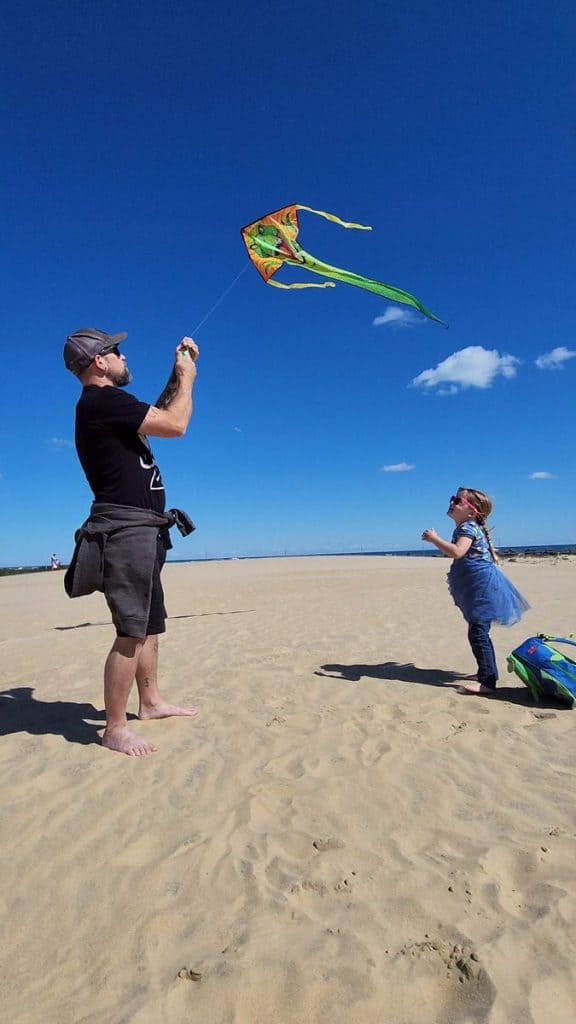 Flying at kite at Jockey's Ridge State Park in Outer Banks, NC