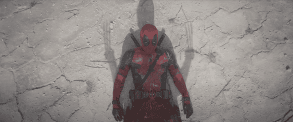 Wolverine standing over Deadpool