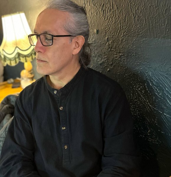 Jesus Acosta with closed eye