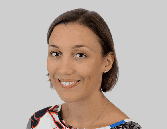Woman smiling, representing Quantilia's innovative data solutions.