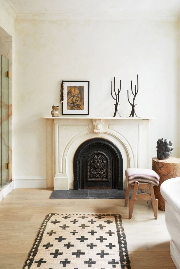 fireplace decorating ideas 57 Easy Fireplace Decorating Ideas That’ll Look Stylish All Year Long calderone townhouse 09 1554909556