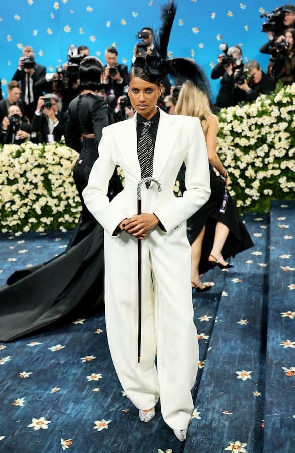 White power suit with exaggerated shoulders and polka-dot tie at the Met Gala 2025, reflecting the evolution of Black Dandy style.