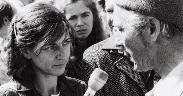 Ann Cooper interviewing Lithuanians at their first pro-independence demonstration, 1987.