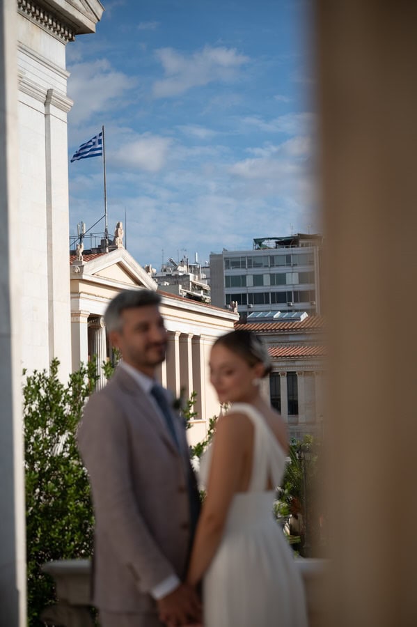 Romantic couple moment in Athens after civil wedding