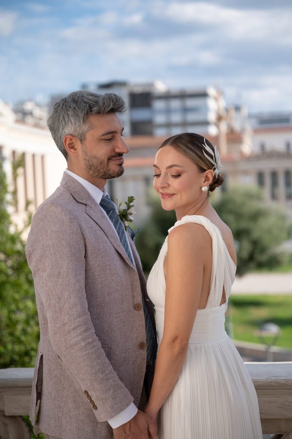Romantic couple moment in Athens after civil wedding