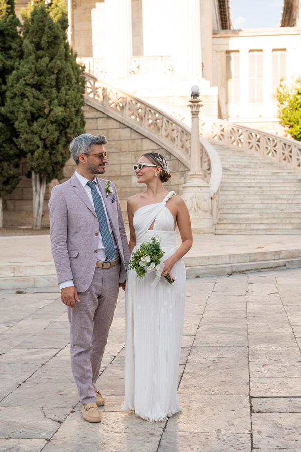 Stylish bride and groom in Athens architecture