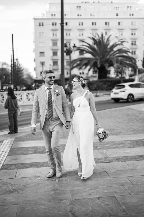 Stylish bride and groom in Athens architecture